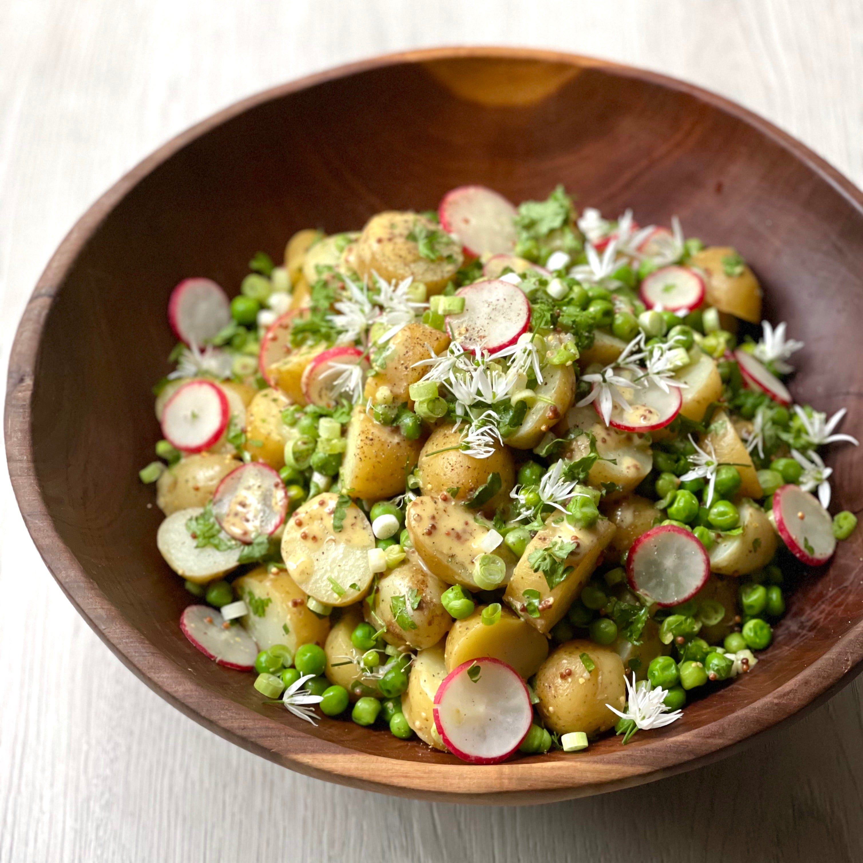 Summer potato salad with peas, spring onions and radish – Aspall